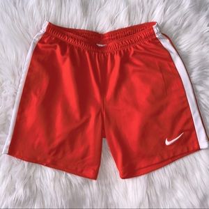 orange nike shorts